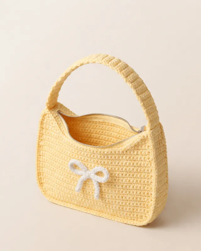 Mini Handbag with Bow: handmade crochet by Crochet By Pihu